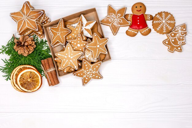 top view fir tree branches, dried orange rings, and cookies