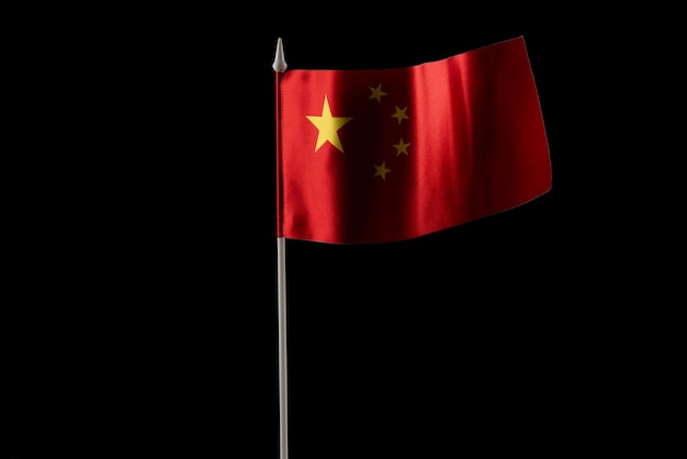 Вид сверху флаг Китайской Народной Республики с копией пространства на черном фоне