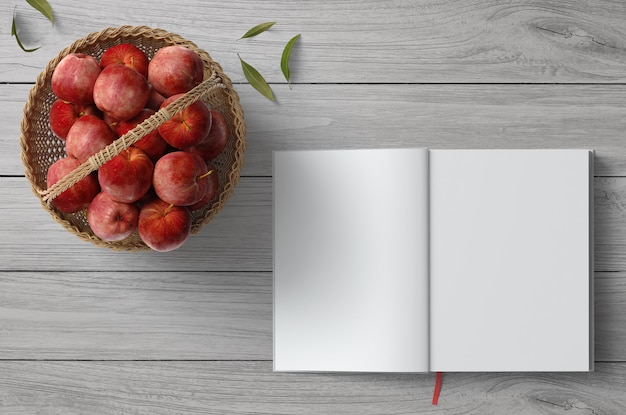 Вид сверху плоская сцена пустого рецепта блокнота и яблок здоровой пищи в корзине ручной работы