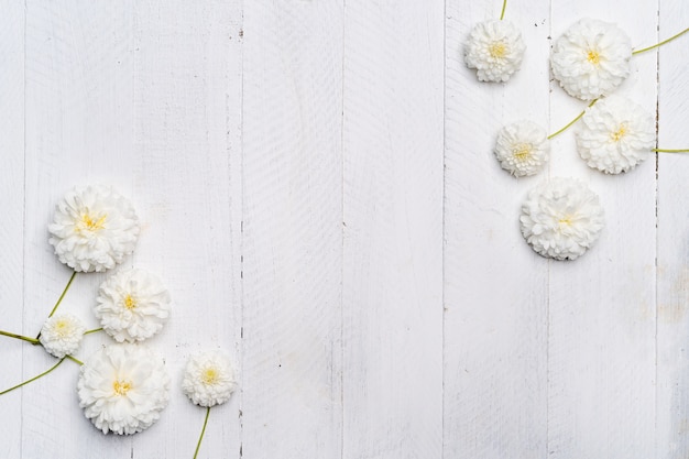 top view flowers on wooden board