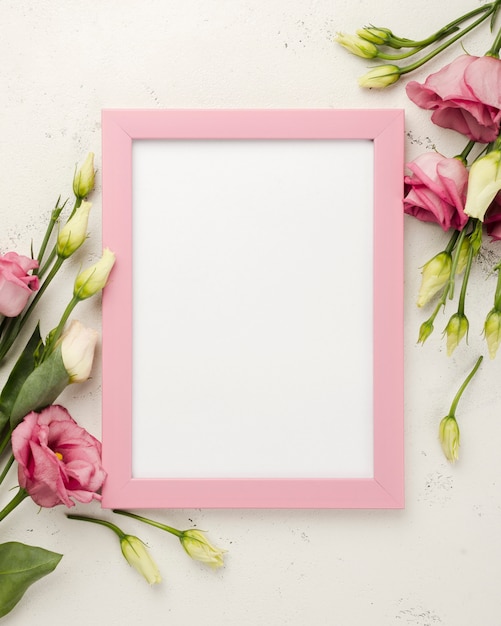 Top view frame beside roses