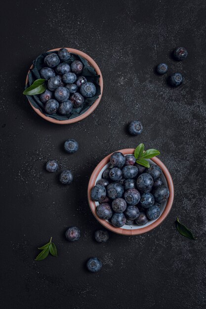 Top view fresh blueberries in bowls