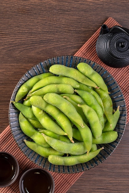 Top view of fresh boiled edamame with copy space