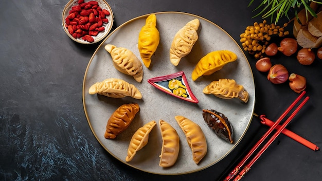 top view of fresh and delicious chinese Chuseok on a dark background