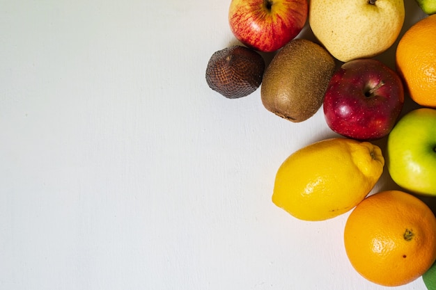 Top view Fresh organic fruits isolated on white background nutrition concept whitespace for text