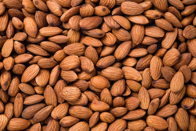 Top view of fresh raw peeled almonds