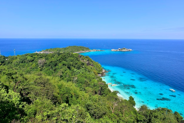 Top view from hill top at a turquoise sea island