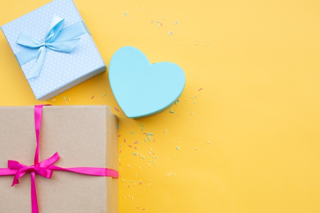 Top view of gift boxes with colorful ribbons