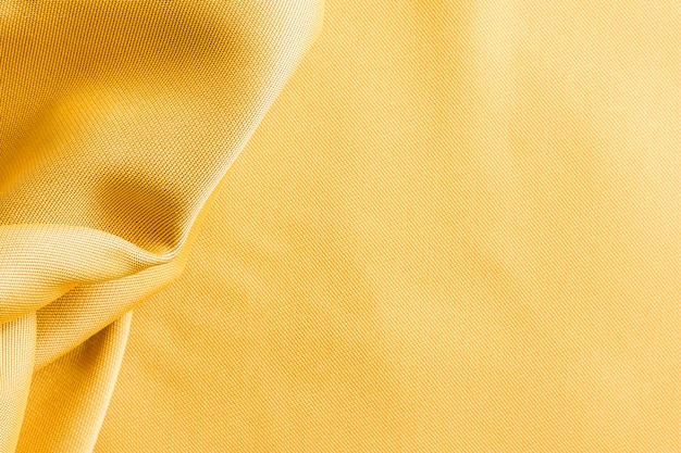 Вид сверху золотая текстура ткани