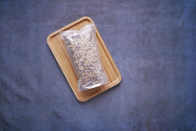 Top view of granola Musli in a plastic packet on table