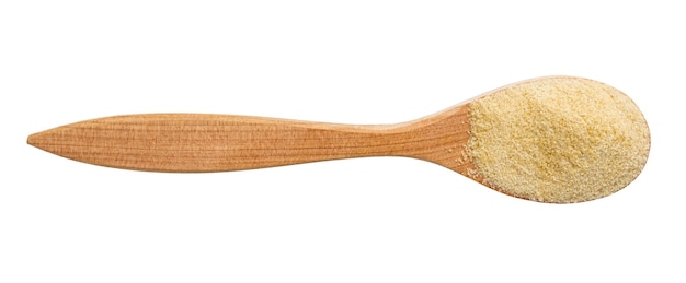 Photo top view of granulated coconut sugar in wood spoon