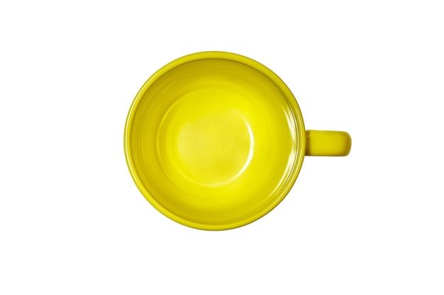 Top view green yellow empty clean round with handle ceramic coffee mug on isolated white background