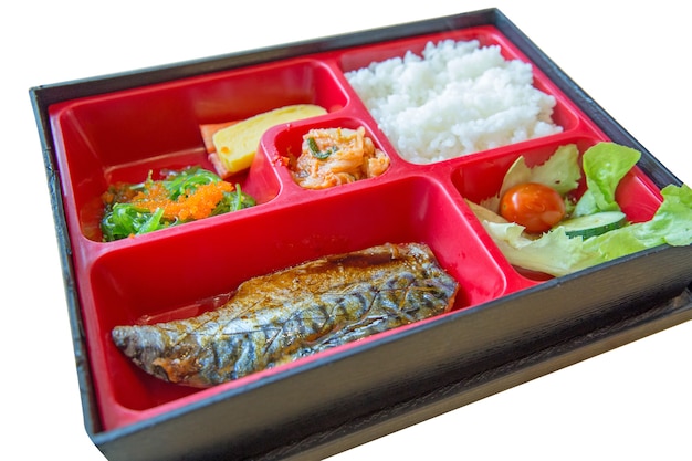 Photo top view of grilled saba bento set fresh food portion in japanese rice and seaweed, focus selective.