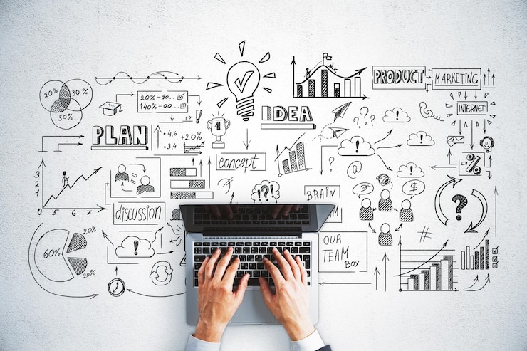 Foto top view hand met behulp van laptop en het tekenen van de wereldwijde business interface