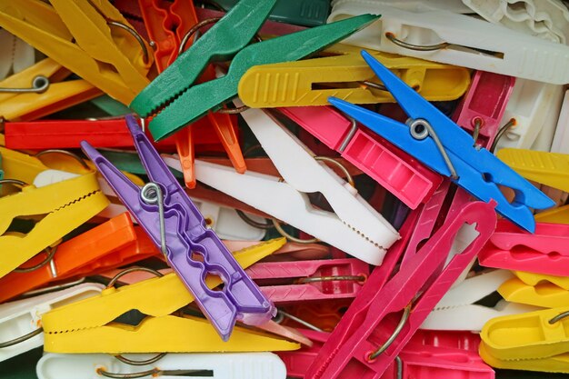 Top view of heap of colorful clothespins