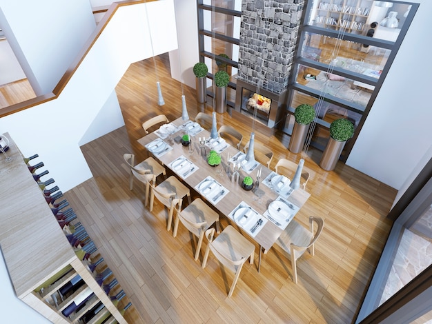 Photo top view of the high ceiling dining room with served table for ten persons.