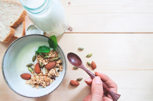 Top view of homemade yogurt with almond granola