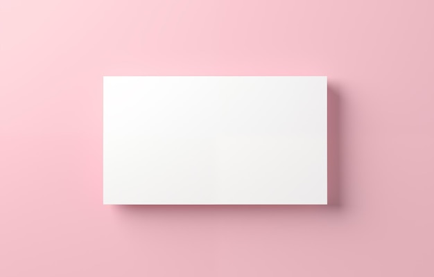 Photo top view of horizontal business card mockup isolated on pink background
