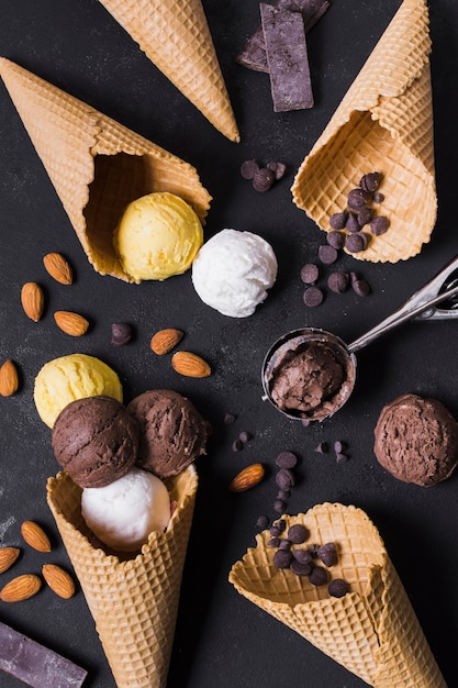 top view ice cream cones and scoops