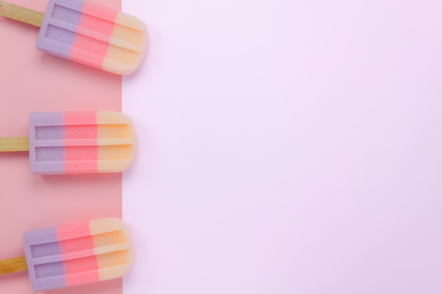 Photo top view ice cream stick on paper.