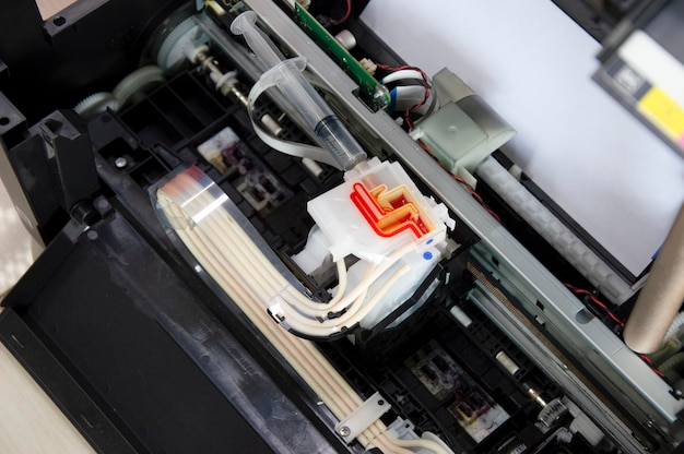 Top view inside the printer repairing a problem color