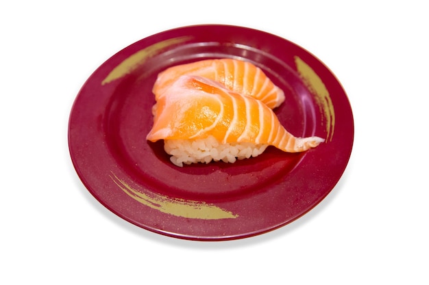 Vista dall'alto del sushi di salmone fresco giapponese con riso giapponese a fuoco selettivo