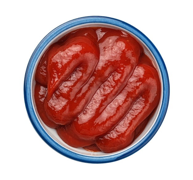 Photo top view of ketchup sauce isolated on white background