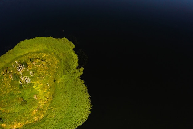 Top view of lake Drivyaty in the Braslav lakes National Park, the most beautiful lakes in Belarus.An island in the lake.Belarus.