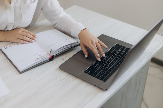 Top view of laptop and notebook for learning Online Learning Webinar