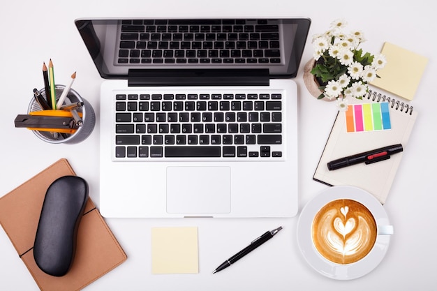 Top view laptop or notebook workspace office on white table