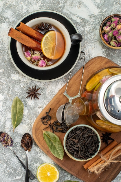 Top view lemon tea in cup and kettle on a white background flower ceremony food color morning flavor fruit breakfast