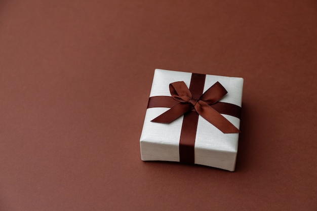 Top view of a little gift box with ribbon