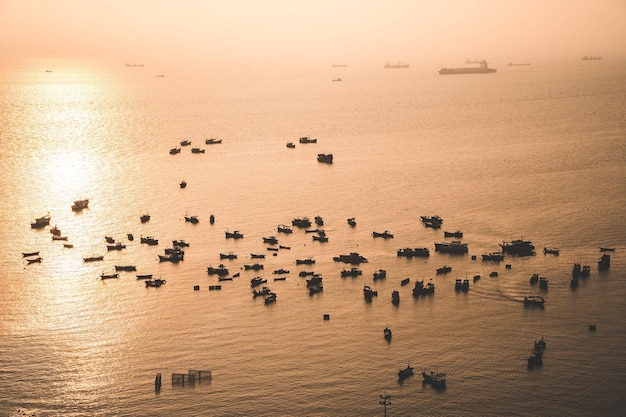 Top view of local fisherman boats in the deep blue sea tropical seascape Travel concept