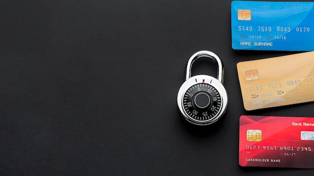 top view of lock with credit cards and copy space
