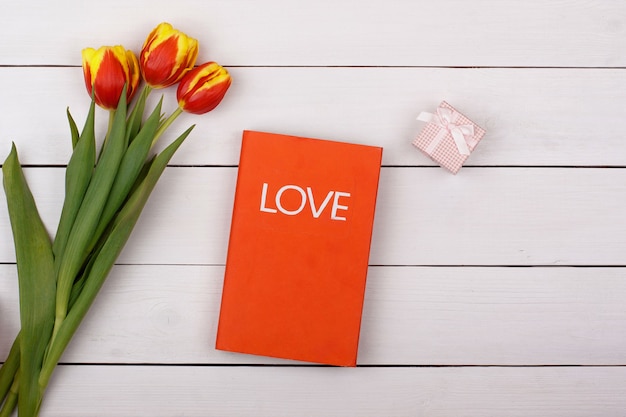 Top view love greeting card with flowers