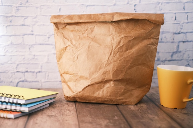 Photo top view of a lunch packet on color background