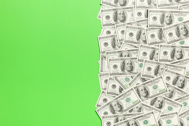 Photo top view of many dollar bills background