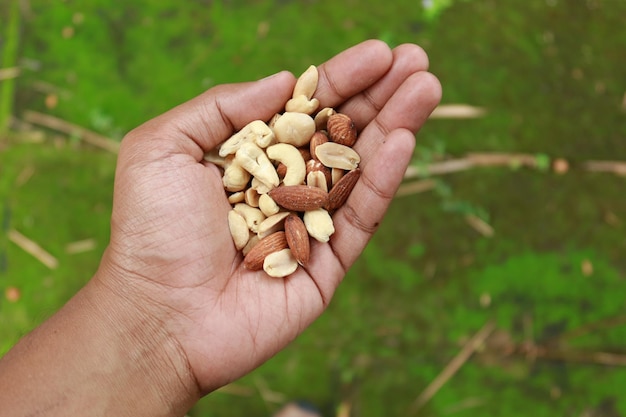 Top view of many mixed nuts on hand