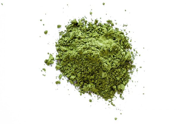 Top view of matcha tea powder isolated on a white background