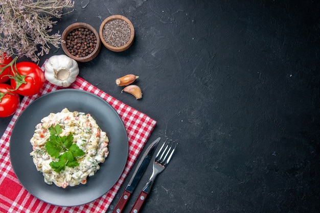 top view mayonnaise chicken salad with pepper and red tomatoes