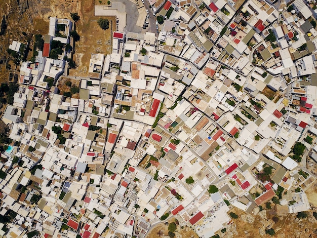 Top view of Mediterranean city with a structure of streets and houses.