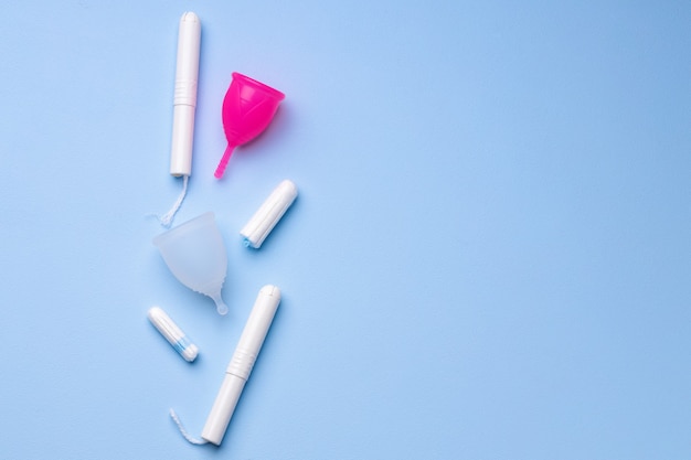 Top view of menstrual cup and medical tampon