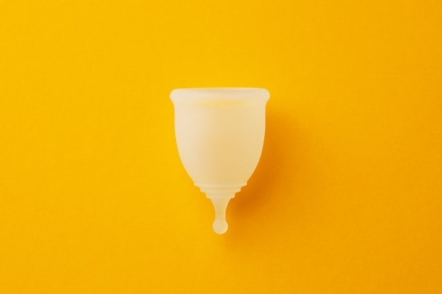 Top view of menstrual cup on paper