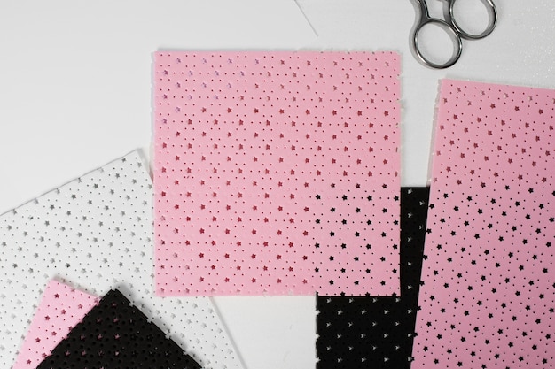 Photo top view microperforated sheet and scissors