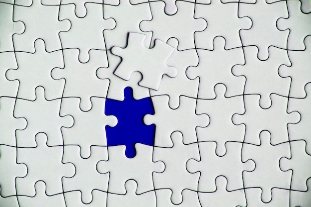 Top view of missing jigsaw puzzle Conceptual