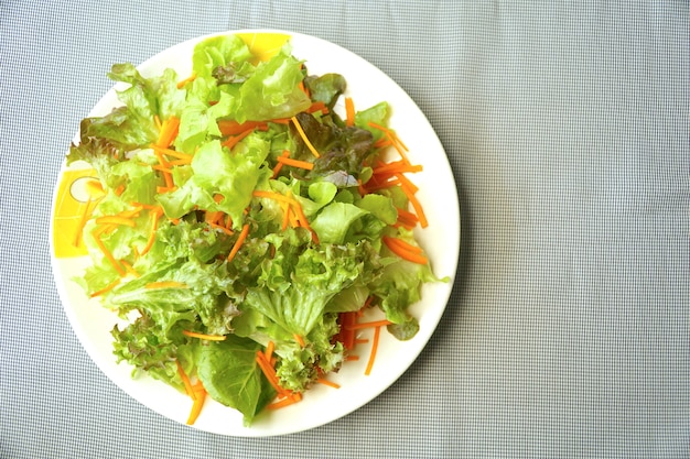 Top view of Mix salad.Lettuce leaf and carrot. Organic vegetable. Good for diet.Healthy.