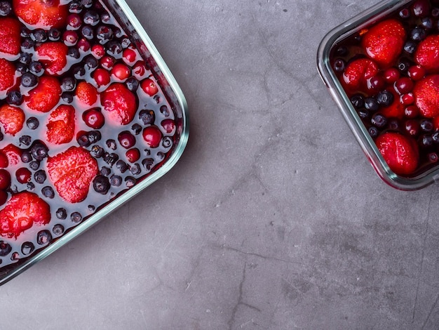 Top view of mixed jelly fruits strawberry blueberry cranberry