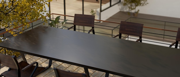 Top view of a modern contemporary meeting table on an outdoor terrace