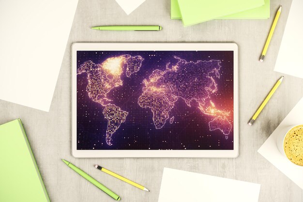 Top view of modern digital tablet display with abstract graphic world map big data and networking concept 3d rendering