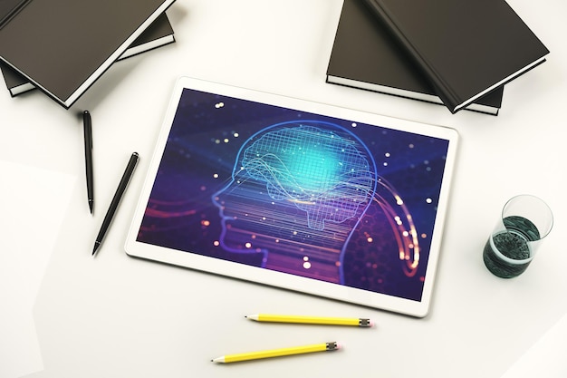 Foto vista dall'alto del moderno schermo del tablet digitale con microcircuito creativo della testa umana tecnologia futura e rendering 3d del concetto di intelligenza artificiale